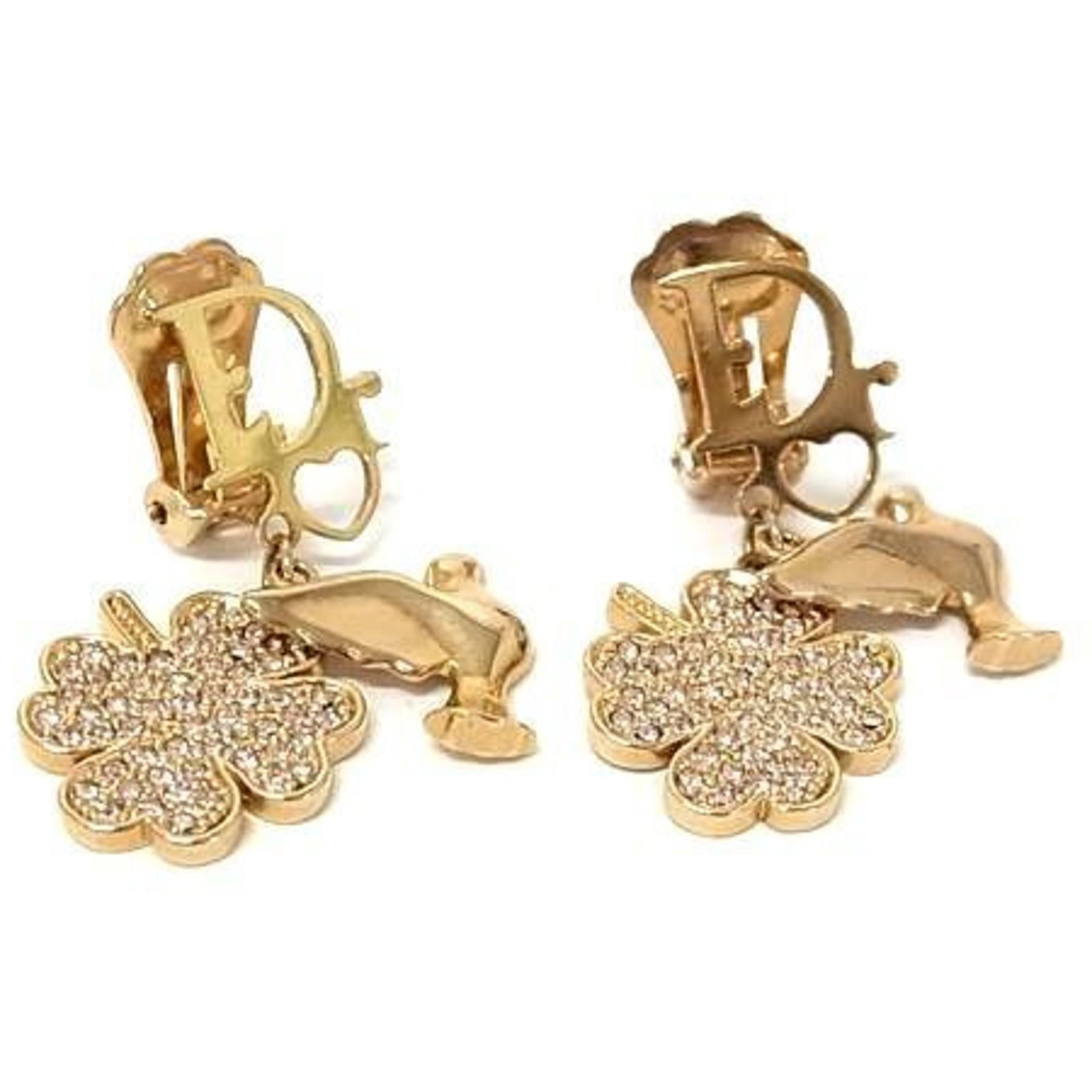 Christian Dior Clip Earrings Metal: Christian Dior Clip Earrings Metal Christian Dior's iconic Clip Earrings Metal are a timeless accessory for women. Featuring rhinestone stones and made from metal, these earrings showcase a classic