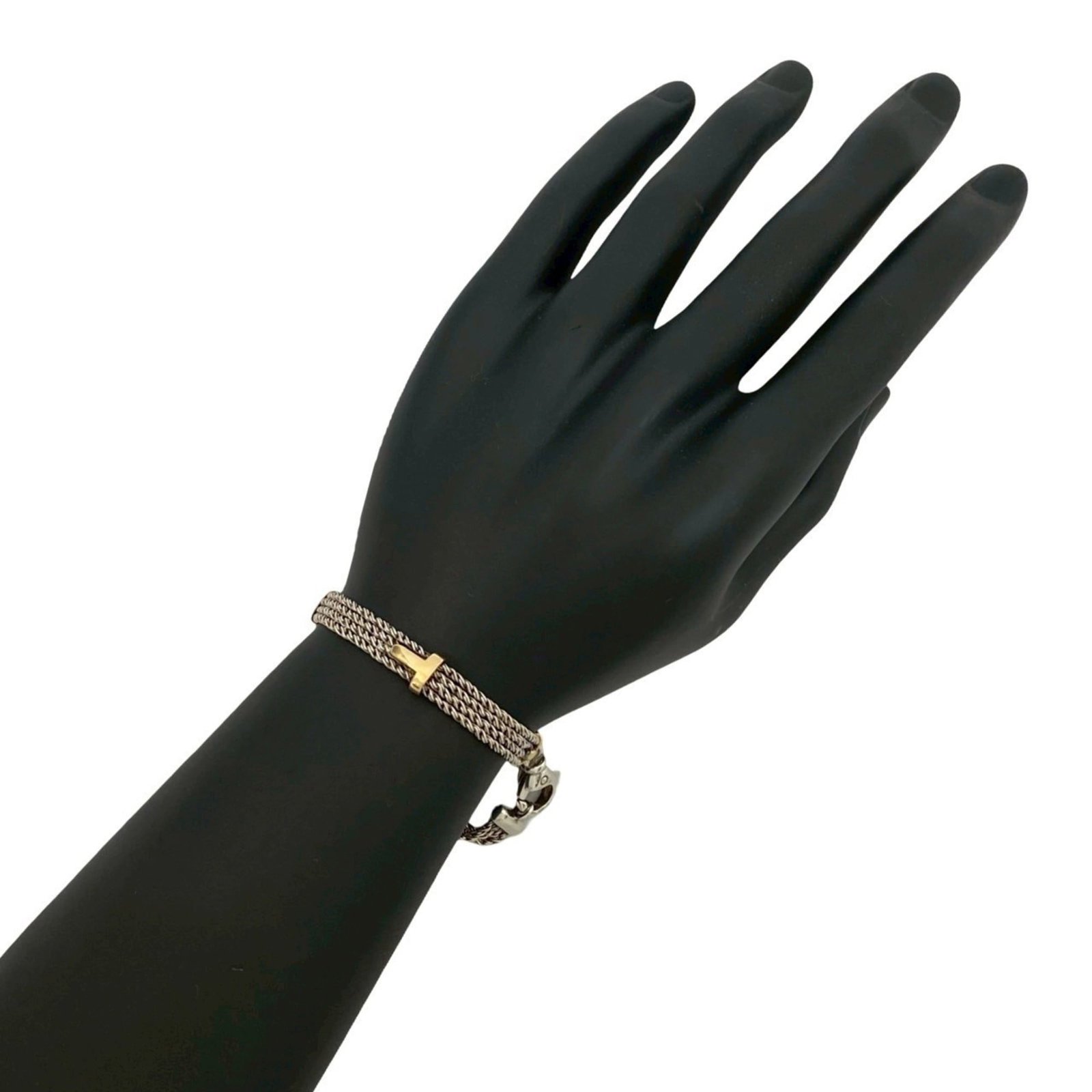 Tiffany Charm Bracelet Gold (18K), Silver 925: Tiffany Charm Bracelet Gold (18K), Silver 925 Tiffany's iconic charm bracelet shines with 18K gold and sterling silver accents. This versatile piece boasts a length of 18.5cm, perfect for adding a tou