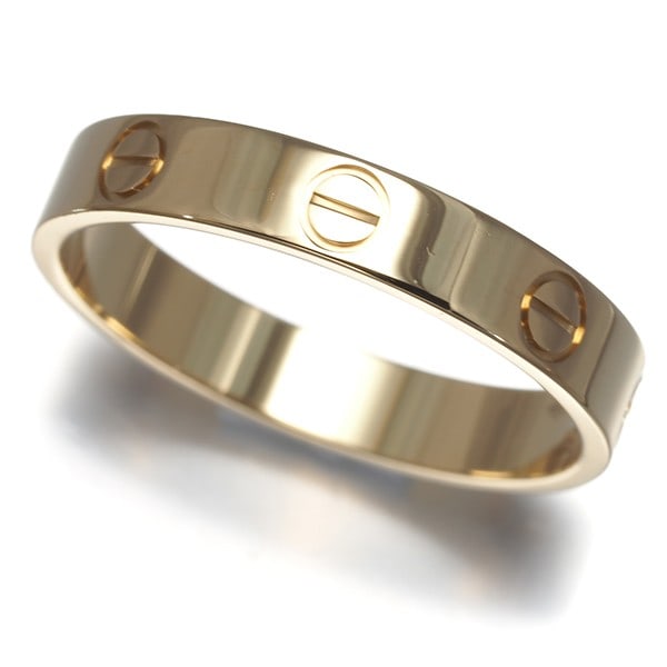 Strict Rules: Strict Gold Ring: Strict Rules: Strict Gold Ring Strictly speaking, this 18k yellow gold Cartier ring boasts understated elegance. With its EU57 size and no main stone, it's a sleek and simple design that makes a subtl