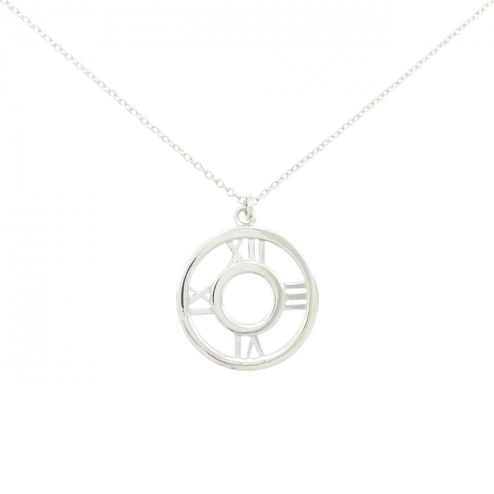Tiffany & Co. Atlas Open Medallion Medium Necklace: Tiffany & Co. Atlas Open Medallion Medium Necklace Tiffany & Co.'s Atlas Open Medallion necklace boasts a classic design with intricate details. The medium-sized pendant features a silver 925 construc
