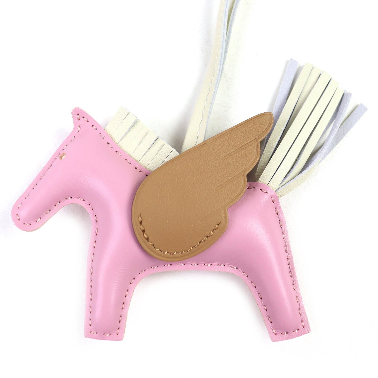 Hermes Handbag Charm Agneau Milo, Swift Leather: Hermes Handbag Charm Agneau Milo, Swift Leather Agneau Milo and Swift Leather come together in this unique Hermes Handbag Charm. The combination of these materials gives the charm a distinctive look a