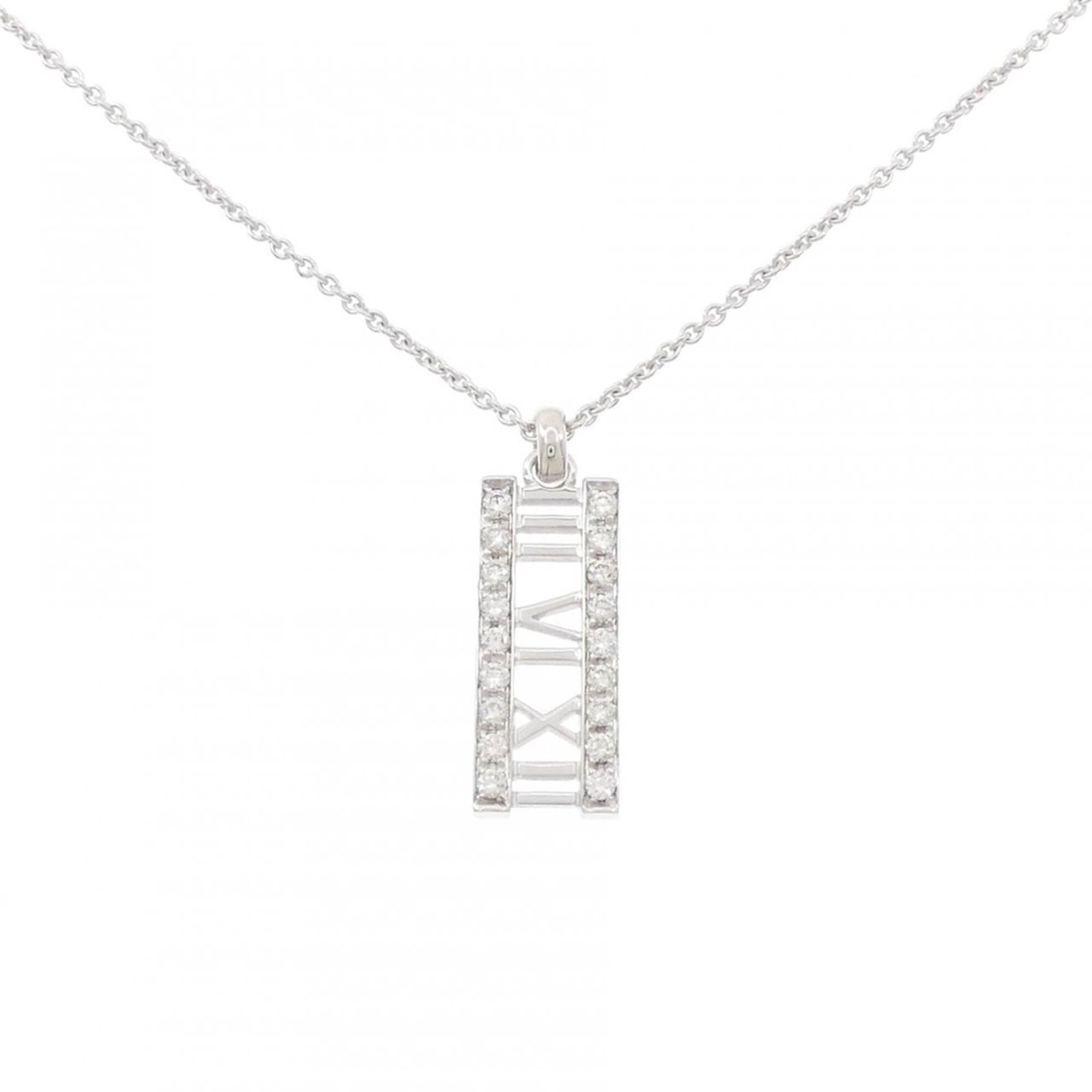 Tiffany & Co. Atlas Open Bar Necklace: Tiffany & Co. Atlas Open Bar Necklace Tiffany & Co.'s Atlas Open Bar Necklace boasts an elegant design with a white gold (18K) pendant featuring a diamond. The necklace's 41 cm circumference and 26.4m