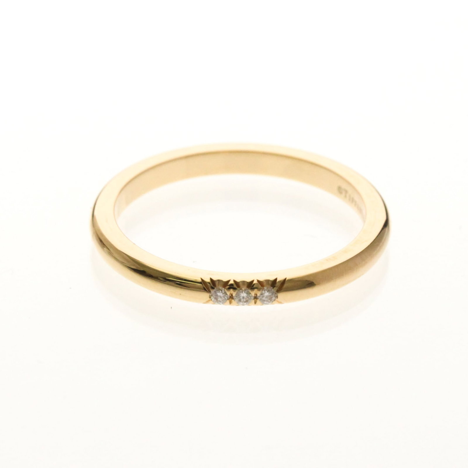 Tiffany Band Ring Pink Gold (18K): Tiffany Band Ring Pink Gold (18K) Pink Gold (18K) band ring from Tiffany features a delicate design with a subtle sparkle. This used ring in very good condition showcases a few traces of usage and