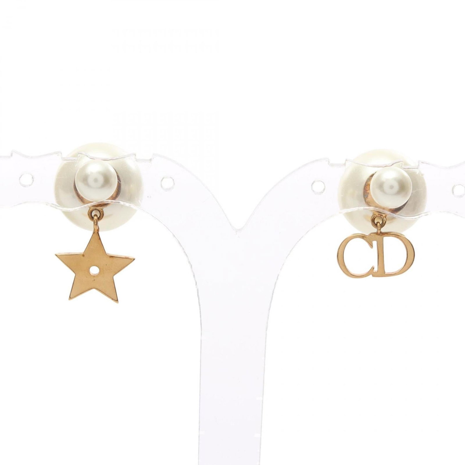 Christian Dior Stud Earrings Gold Plating: Christian Dior Stud Earrings Gold Plating Christian Dior's iconic stud earrings boast elegant gold plating, adding a touch of sophistication to any outfit. With their classic design and subtle