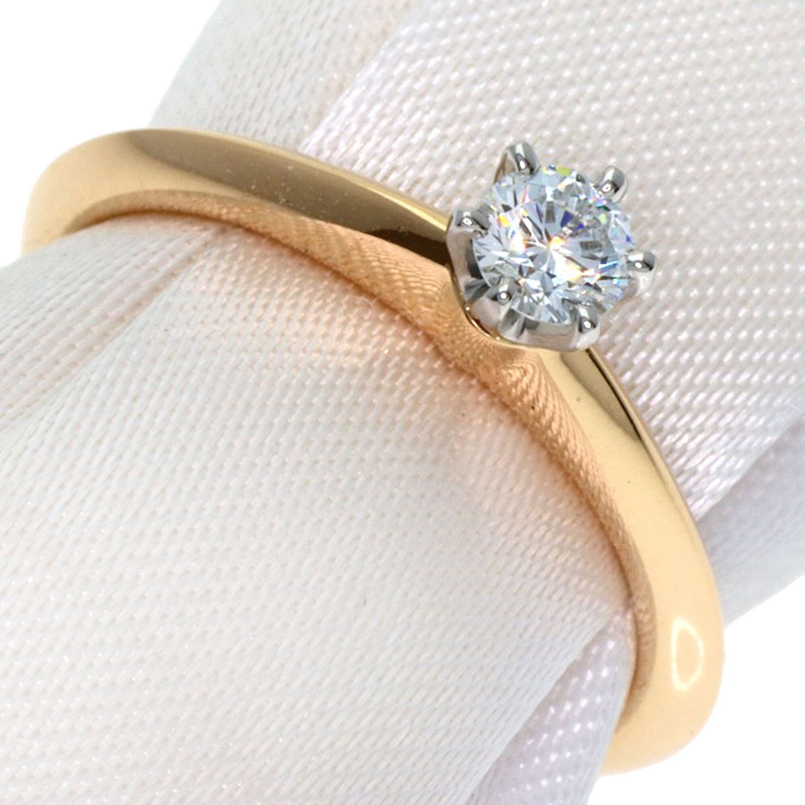 Tiffany Band Ring Pink Gold (18K), Platinum 950: Tiffany Band Ring Pink Gold (18K), Platinum 950 Pink Gold (18K) and Platinum 950 come together in this elegant Tiffany band ring, showcasing a subtle pink hue. The diamond stone adds a touch of sophis