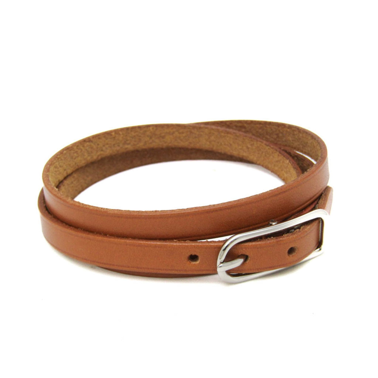 Hermes Bangle Leather, Metal: Hermes Bangle Leather, Metal Brown leather and silver metal come together in this classic Hermes bangle, crafted with a timeless design. The subtle scratches and minor dirt marks only add to its well-
