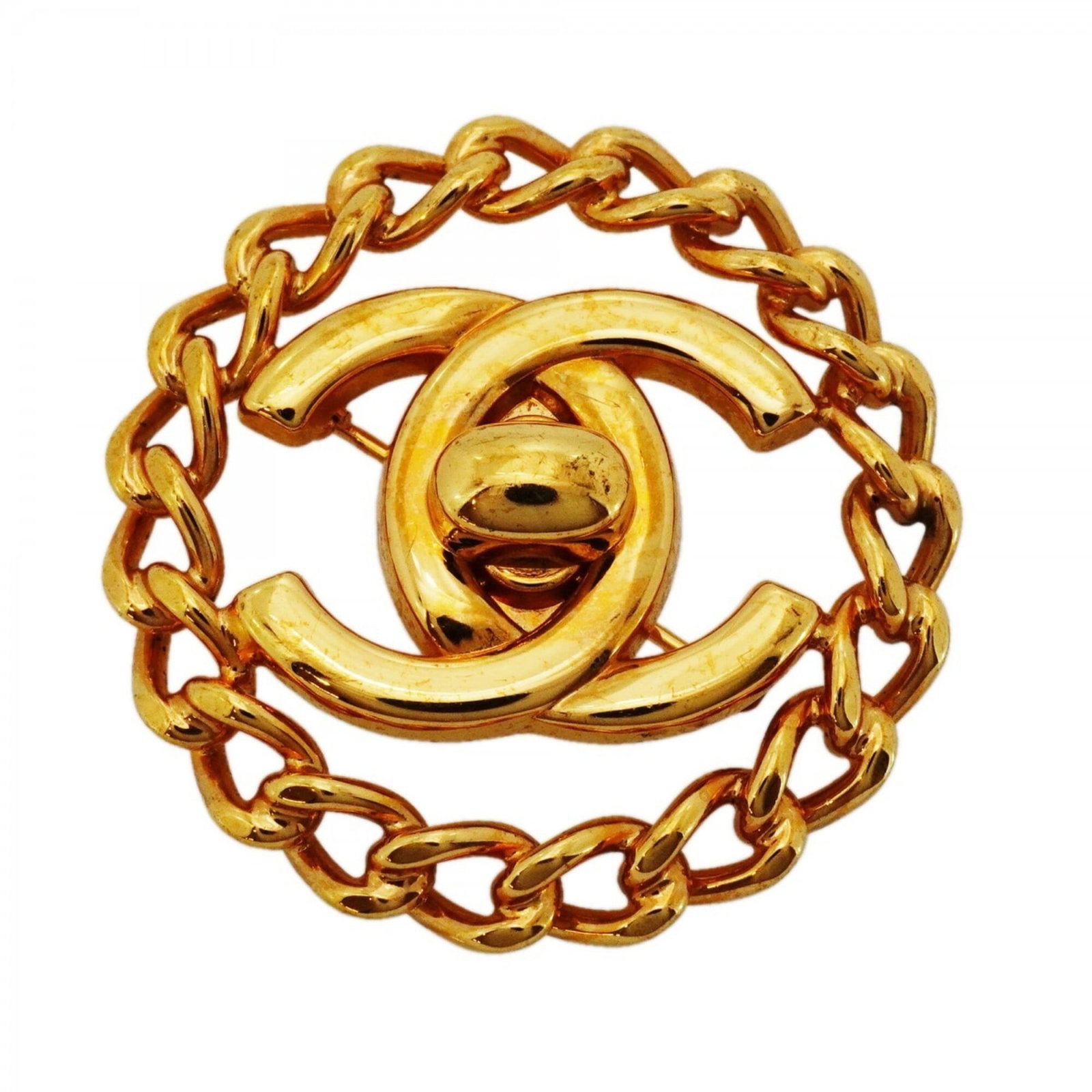 Chanel Brooch Gold Plating: Chanel Brooch Gold Plating Chanel Brooch Gold Plating - A luxurious gold-plated brooch from the iconic French fashion house. This elegant piece features a subtle gold finish and measures approximately