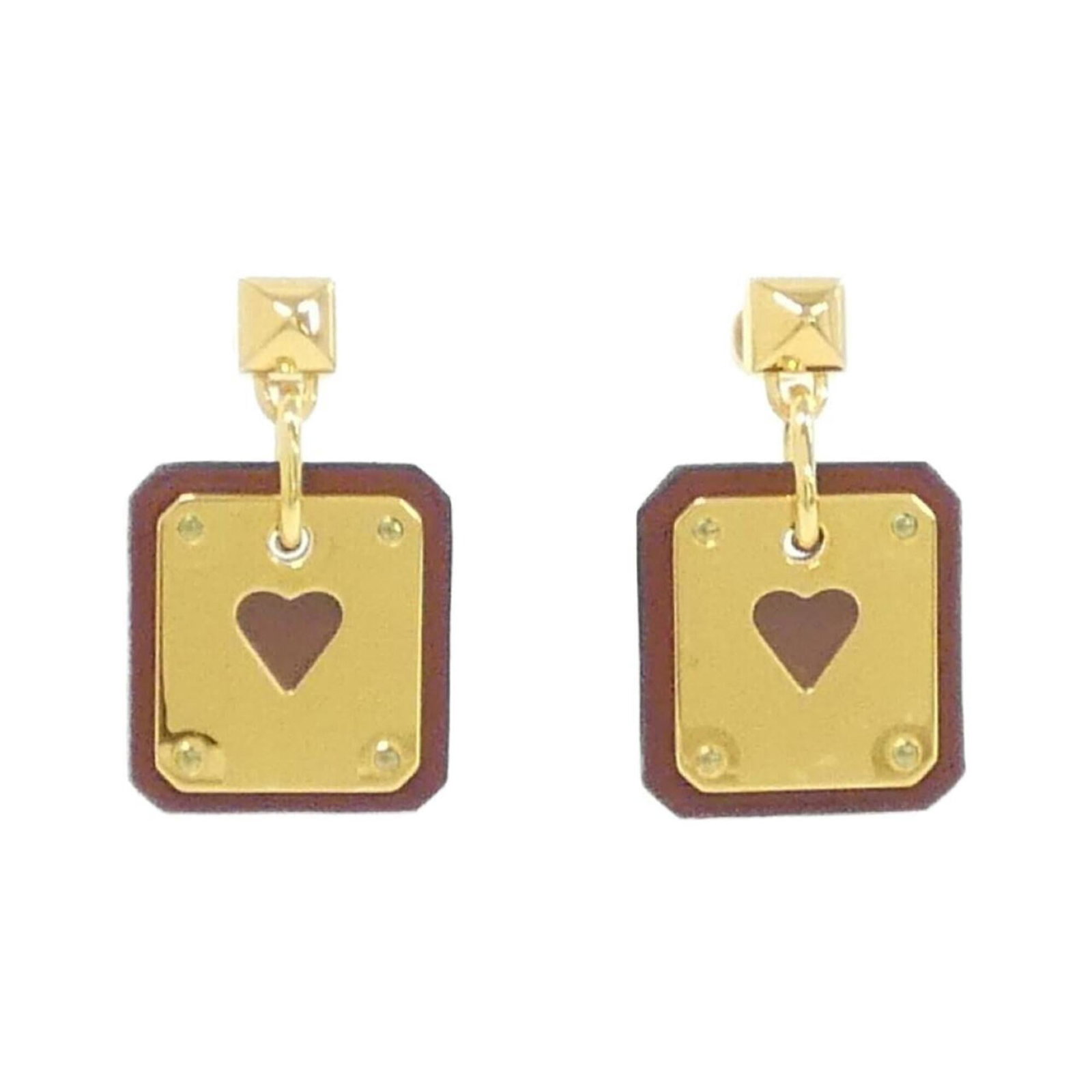 Hermes Stud Earrings Swift Leather: Hermes Stud Earrings Swift Leather Swift Leather earrings from Hermes feature a sleek, understated design. The brown and gold stud earrings have a subtle sheen to the leather, adding depth to their cl