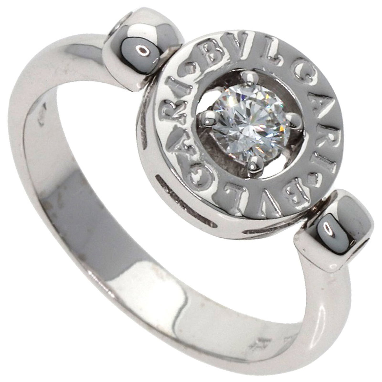 Bvlgari Band Ring White Gold (18K): Bvlgari Band Ring White Gold (18K) Bvlgari Band Ring White Gold (18K) features a sleek design with a diamond stone set against an 18K white gold band. The ring's slender width and delicate details mak