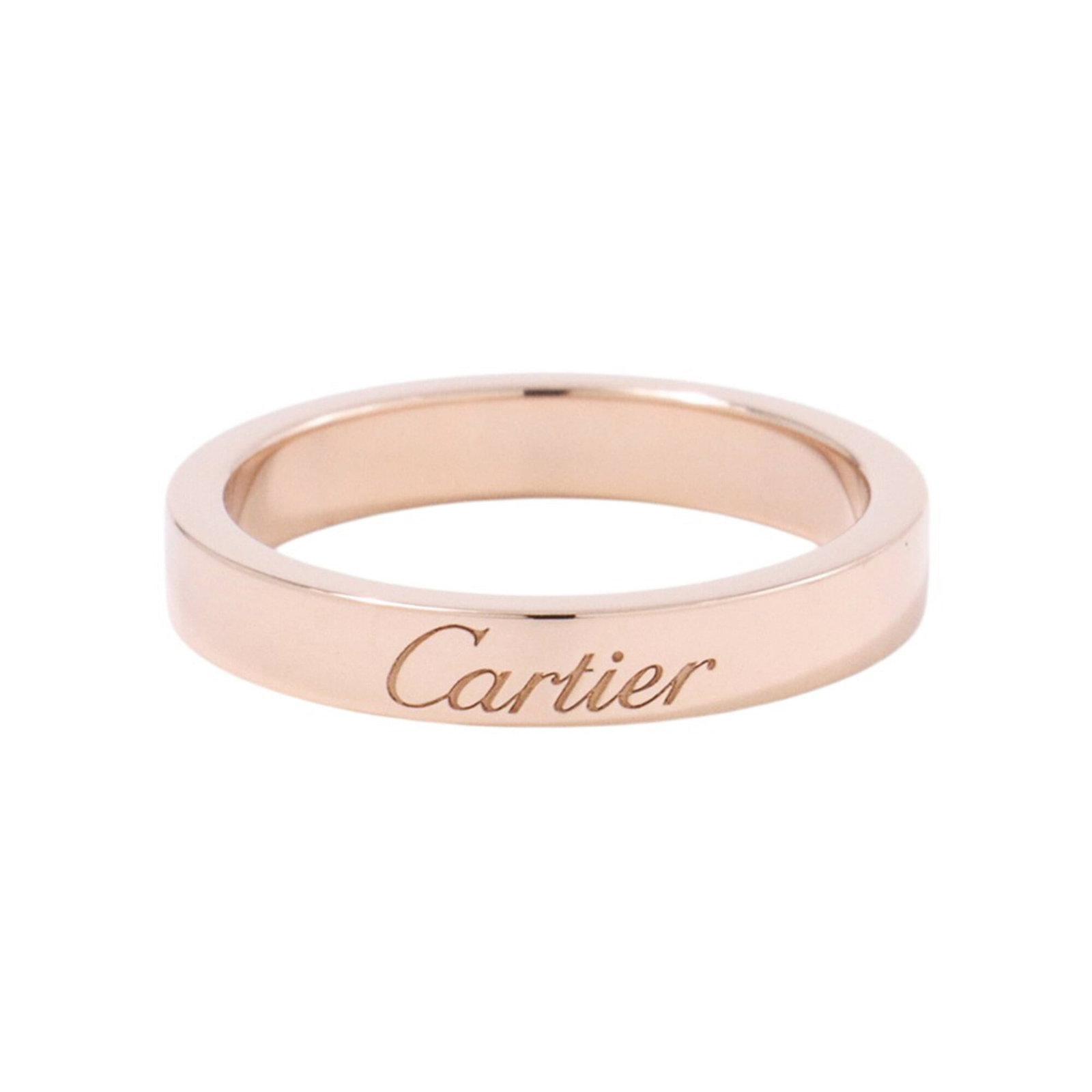 Cartier Band Ring Pink Gold (18K): Cartier Band Ring Pink Gold (18K) Cartier Band Ring in Pink Gold (18K) boasts a sleek design with a subtle pink hue. This used band ring features a few traces of usage and minor scratches, yet remains