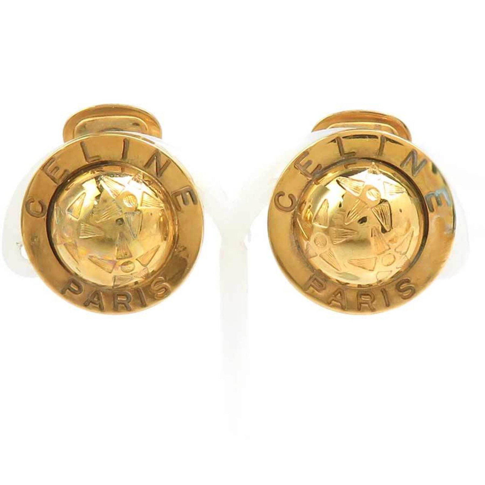Celine Clip Earrings Metal: Celine Clip Earrings Metal Gold Celine Clip Earrings with Traces of Usage. These clip earrings feature metal construction and bear a gold color, with minor scratches and dirt visible. Used in good con