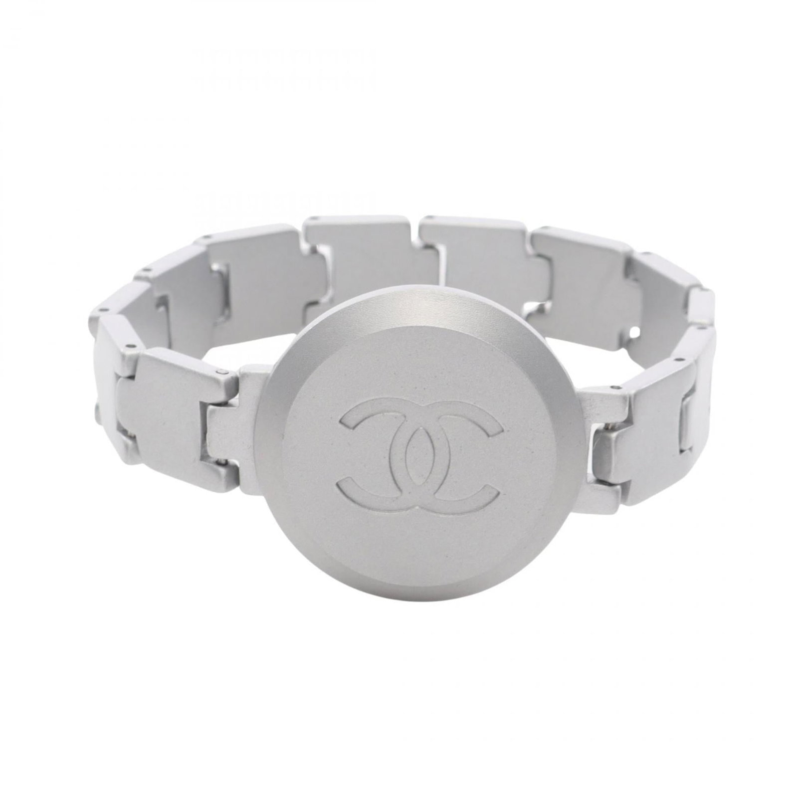 Chanel Charm Bracelet Stainless Steel: Chanel Charm Bracelet Stainless Steel Stainless steel charm bracelet from Chanel, featuring silver tone. This used piece shows traces of usage and minor damages/dirt, still in acceptable condition for