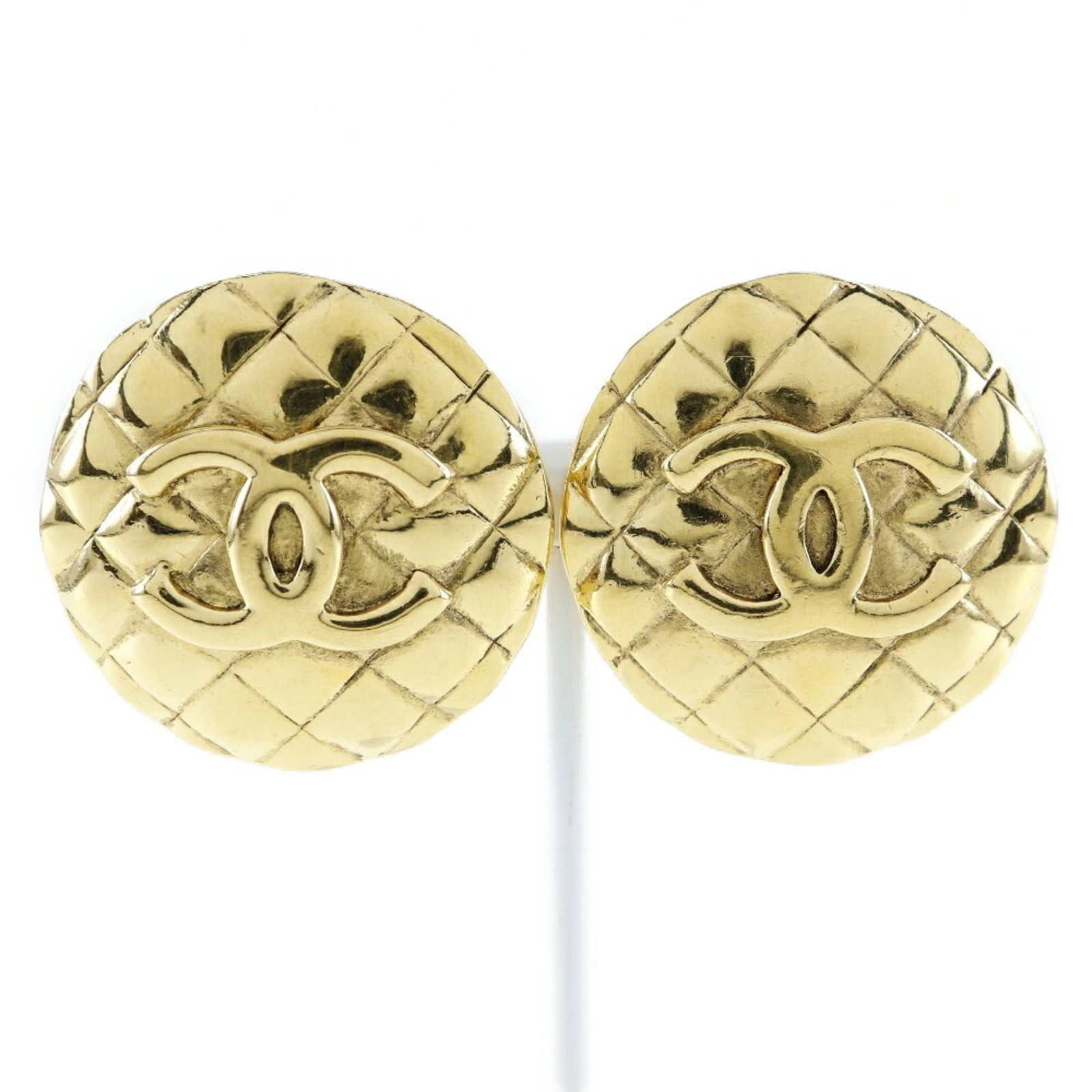 Chanel Clip Earrings Gold Plating, Metal: Chanel Clip Earrings Gold Plating, Metal Gold-plated Chanel clip earrings with a classic design, featuring a subtle gold finish. Measuring approximately 34mm x 35mm, these earrings showcase a timeless
