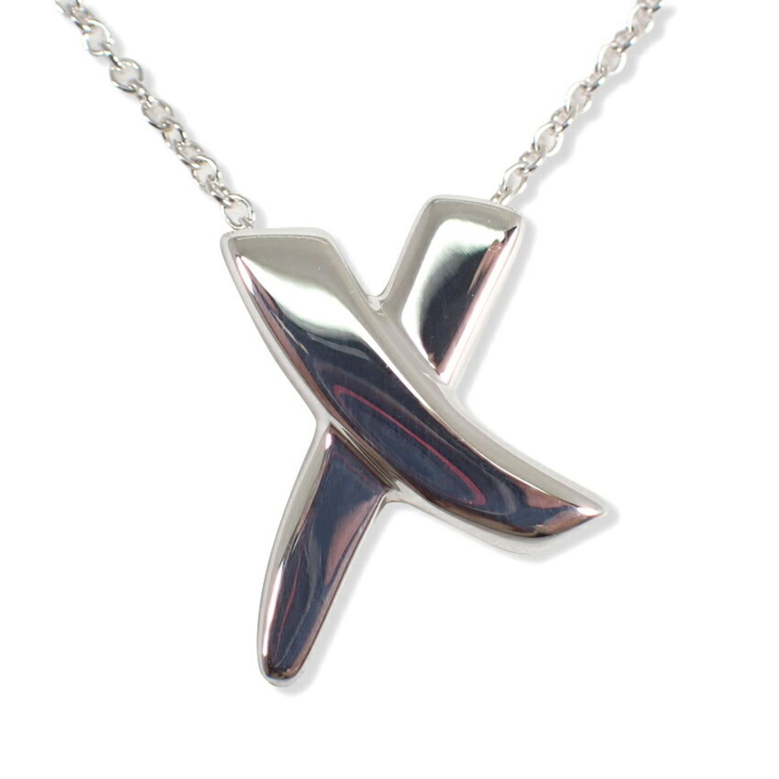 TIFFANY & Co. 925 Kiss Paloma Picasso Necklace: TIFFANY & Co. 925 Kiss Paloma Picasso Necklace Sterling silver pendant from Tiffany & Co.'s Kiss Paloma Picasso collection, featuring a delicate design with a subtle touch of elegance. The necklace bo