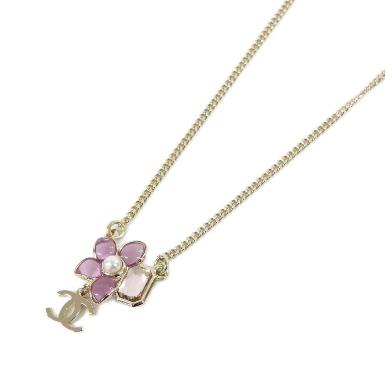 Chanel ABG813 Necklace: Chanel ABG813 Necklace The Chanel ABG813 Necklace boasts a striking pink hue and elegant design. Its 26mm x 18mm pendant size adds a touch of sophistication to any outfit, while its adjustable neck ci