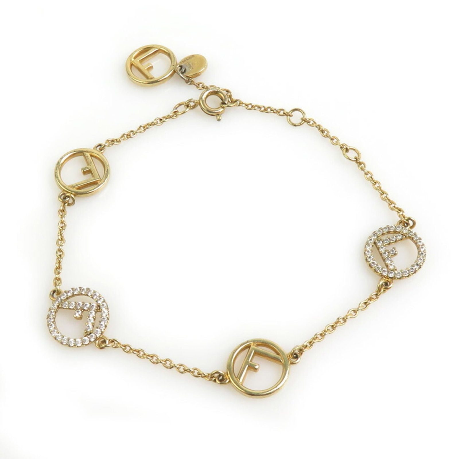 Fendi Charm Bracelet Metal: Fendi Charm Bracelet Metal Gold Fendi Charm Bracelet with Traces of Usage. This 17cm gold charm bracelet features metal construction and has visible scratches and dirt from past use. The item is in go