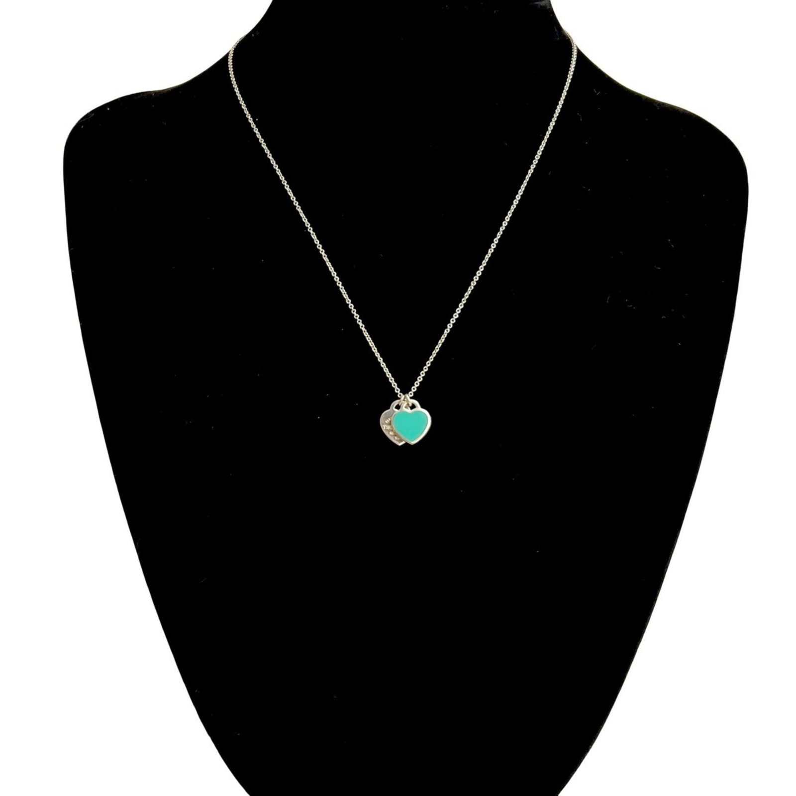 TIFFANY & Co. Tiffany Return to Mini Double Heart Tag 925 Silver Necklace in Blue 11531: TIFFANY & Co. Tiffany Return to Mini Double Heart Tag 925 Silver Necklace in Blue 11531 Tiffany & Co.'s iconic Return to Mini Double Heart Tag necklace shines in this beautiful blue hue. Made from hig