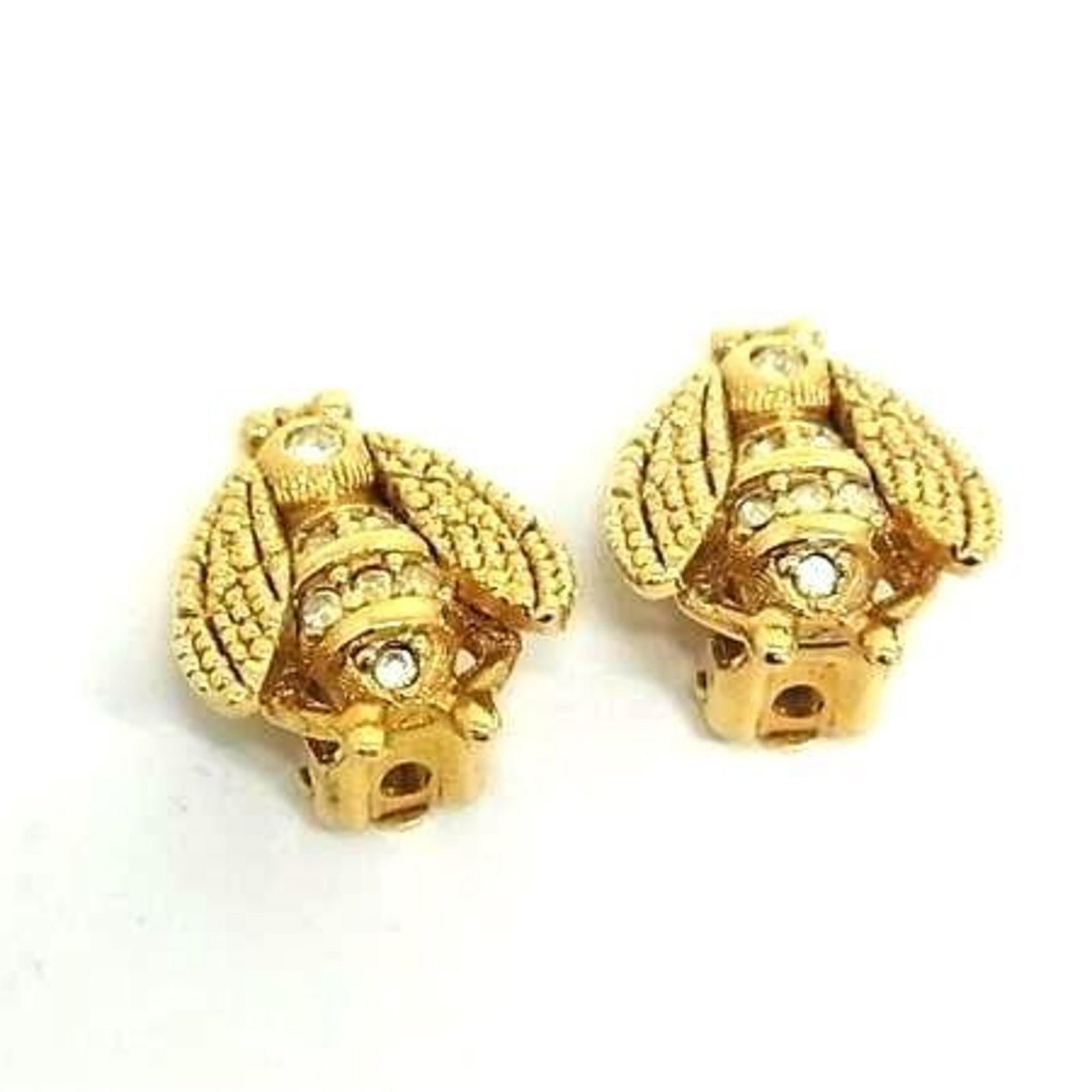 Christian Dior Clip Earrings Metal: Christian Dior Clip Earrings Metal Christian Dior Clip Earrings Metal in Gold feature rhinestone accents, adding a touch of luxury to any outfit. Made from high-quality metal, these earrings showcase