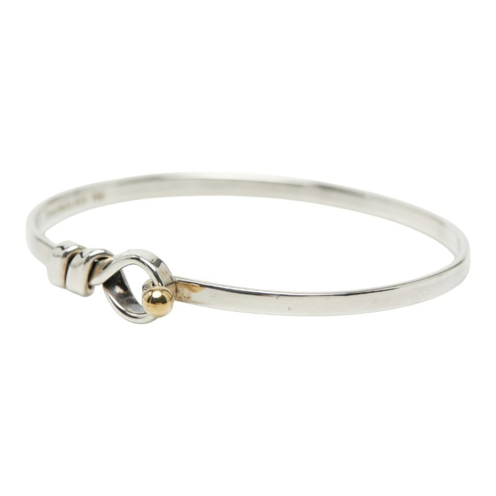 Tiffany Charm Bracelet Silver 925, Yellow Gold (18K): Tiffany Charm Bracelet Silver 925, Yellow Gold (18K) Tiffany's iconic charm bracelet shines in this 16cm length silver and yellow gold (18K) piece. With its subtle scratches and signs of wear, this us