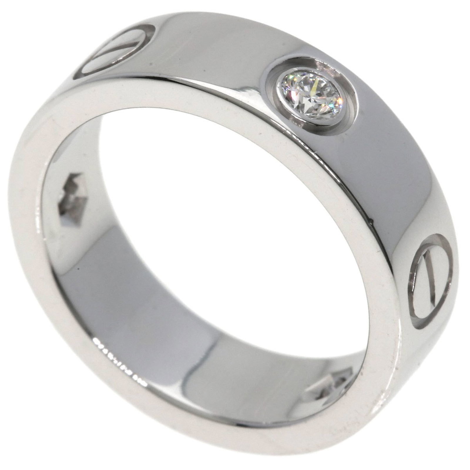Cartier Band Ring White Gold (18K): Cartier Band Ring White Gold (18K) Cartier Band Ring White Gold (18K) features a diamond stone and is made from high-quality white gold. The ring has some scratches and dirt, showing signs of moderate