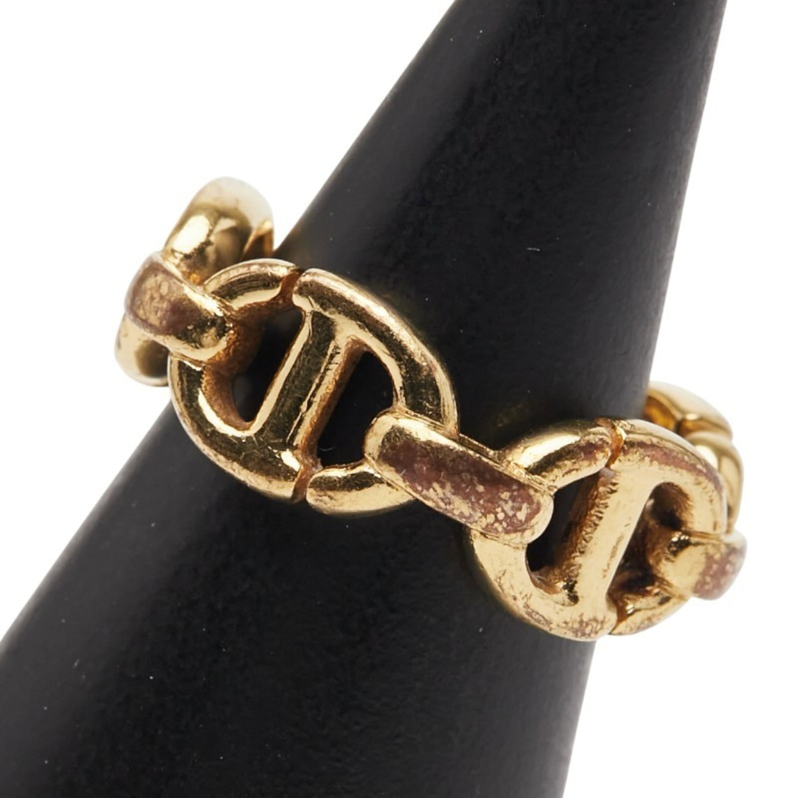 Christian Dior Band Ring: Christian Dior Band Ring Gold band ring from Christian Dior with a worn, used condition featuring traces of usage and minor scratches. The ring's gold material has been well-loved over time, giving