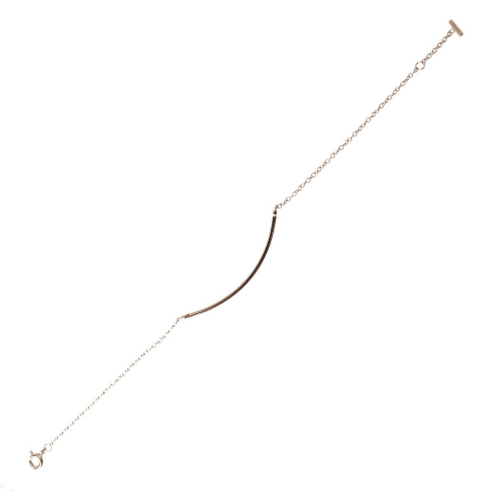 Tiffany Charm Bracelet Gold (18K): Tiffany Charm Bracelet Gold (18K) Tiffany Charm Bracelet Gold (18K) stands out with its elegant pink gold hue and classic charm design. The 17cm length allows for a versatile wear, while the used