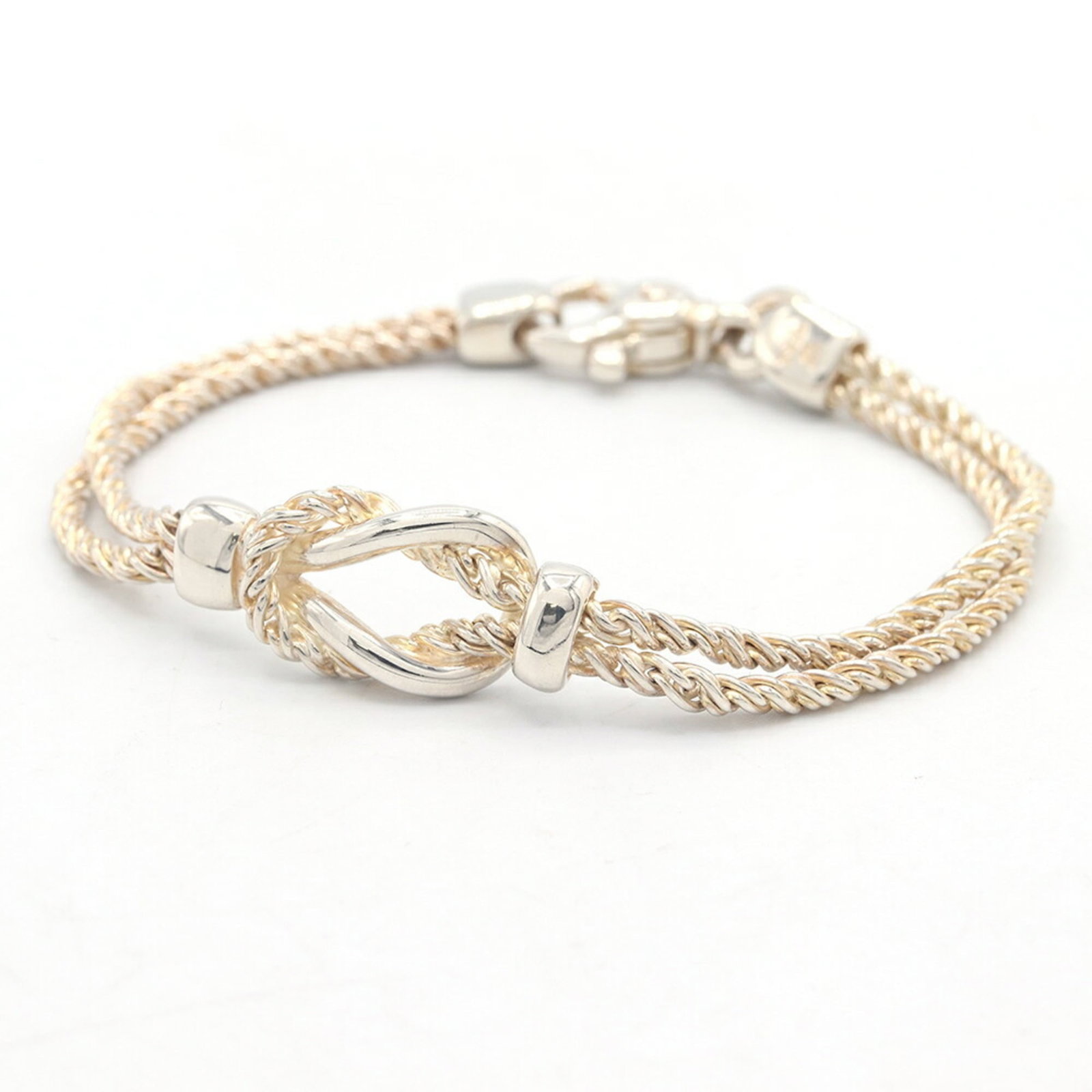 Tiffany Charm Bracelet Sterling Silver 925: Tiffany Charm Bracelet Sterling Silver 925 Sterling silver charm bracelet from Tiffany, featuring a classic design with subtle scratches and signs of use. The 17.5cm long chain has been worn and shows