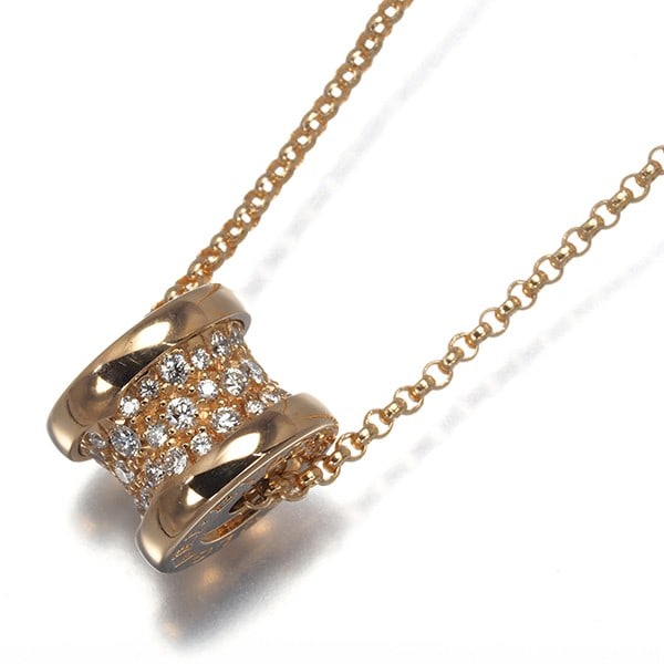 Diamond B Zero1 Necklace 18K Paved Rose Gold: Diamond B Zero1 Necklace 18K Paved Rose Gold BVLGARI's Diamond B Zero1 Necklace showcases an 18k paved rose gold design featuring natural diamonds. The necklace's main stone creation highlights the be