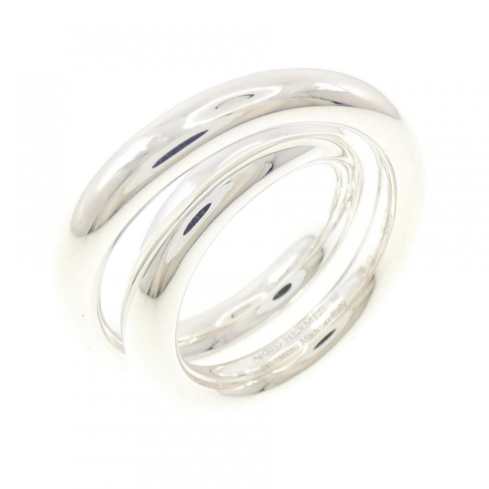 Hermes Vertige Ring: Hermes Vertige Ring The Hermes Vertige Ring boasts an elegant silver design with a few subtle scratches and minor dirt marks, giving it a well-worn appearance. Made from high-quality 925 sterling