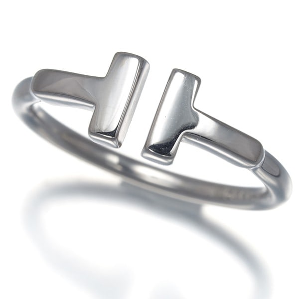 Rings available from Tiffany Co. are made of white gold with a 750ct diamond set in a unique wire: Rings available from Tiffany Co. are made of white gold with a 750ct diamond set in a unique wire White gold Tiffany Co. rings feature a unique wire design and are made with 18k metal purity. The US5