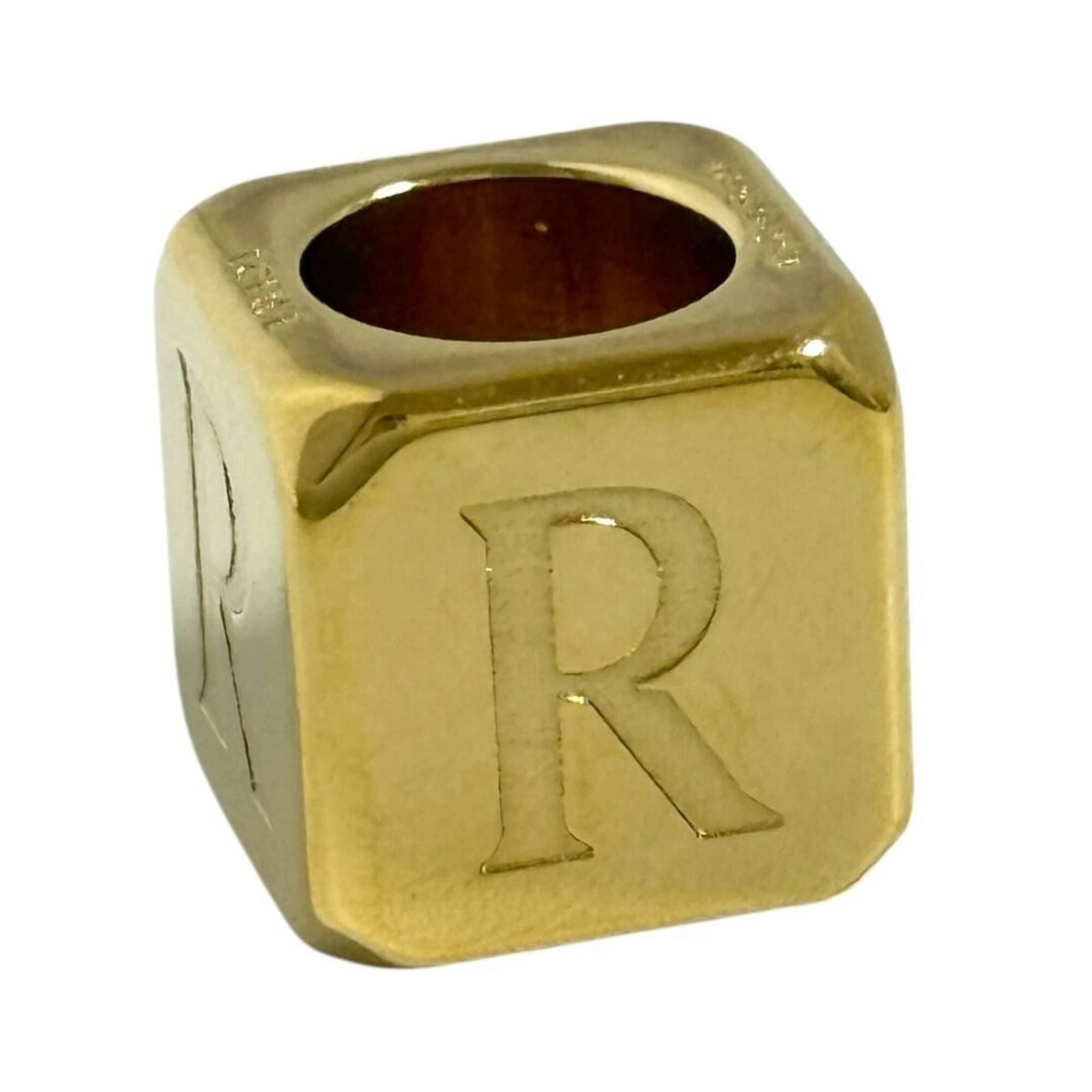 Loewe Bracelet Charm Metal: Loewe Bracelet Charm Metal This Loewe Metal Bracelet Charm features a sleek and sophisticated design. Made from metal, it has a few traces of usage, with some scratches and dirt visible, but remains i