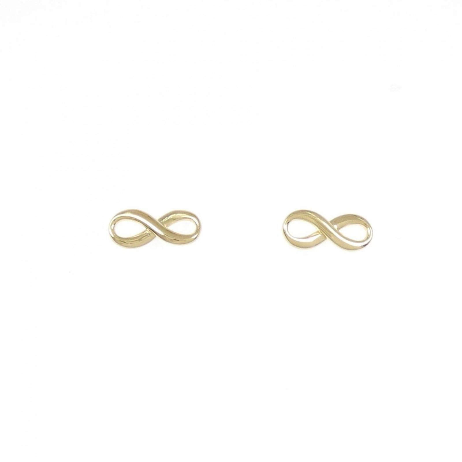Tiffany Stud Earrings Yellow Gold (18K): Tiffany Stud Earrings Yellow Gold (18K) Tiffany's iconic yellow gold stud earrings are a timeless classic. Made from high-quality 18K yellow gold, these understated yet elegant earrings feature a