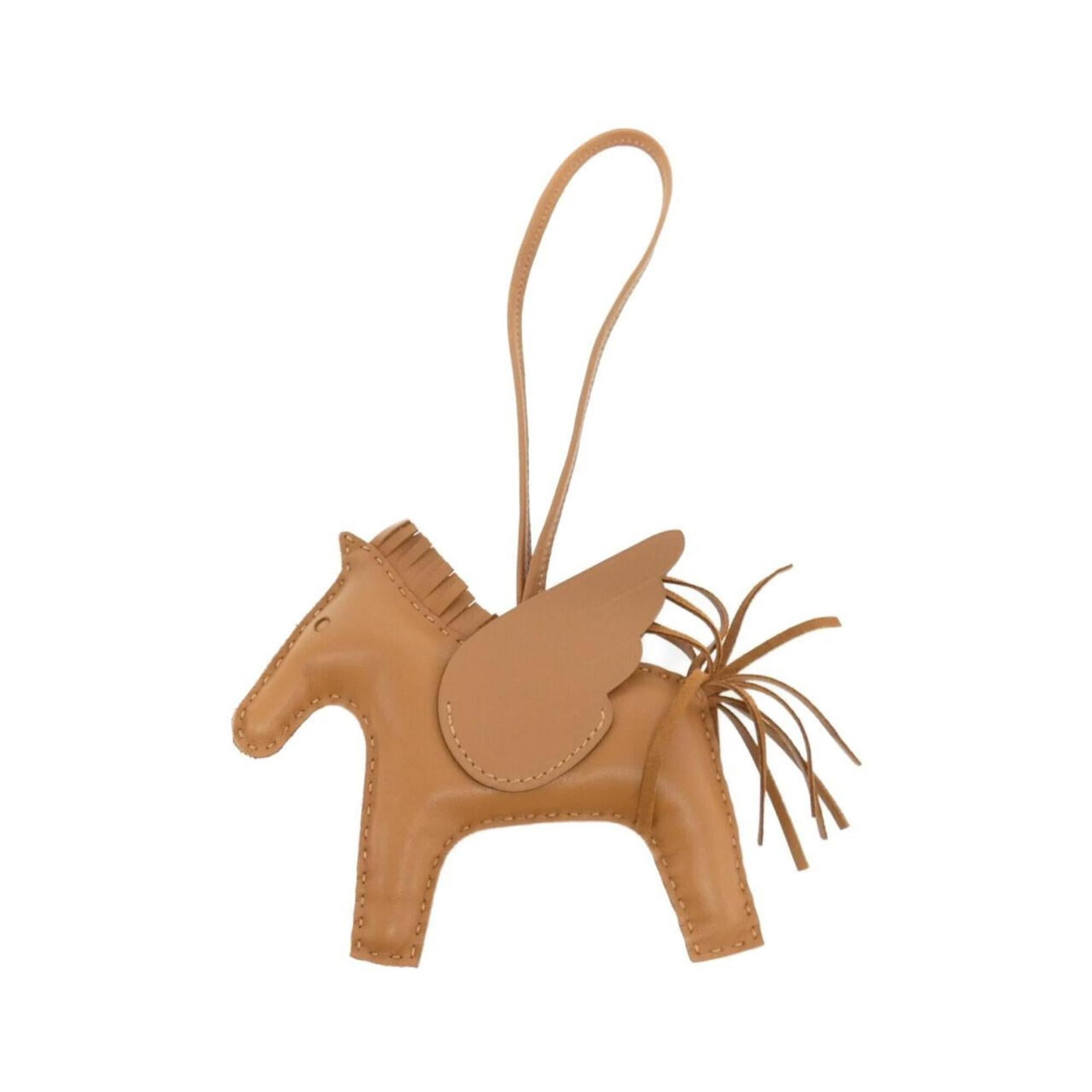 Hermes Handbag Charm Agneau Milo: Hermes Handbag Charm Agneau Milo Agneau Milo Handbag Charm from Hermes boasts a rich brown color and intricate design, showcasing the brand's signature style. This used charm features a few traces of