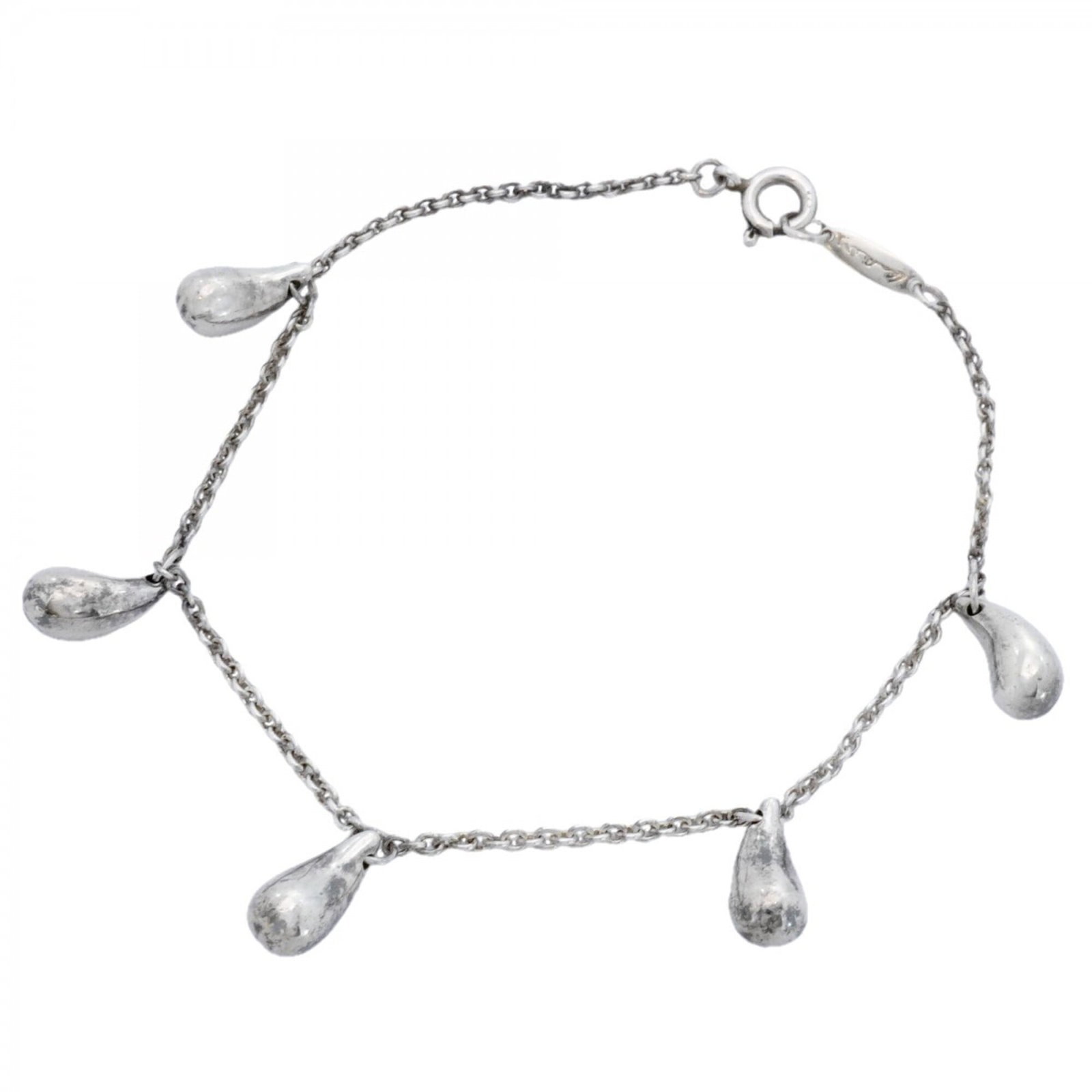 Tiffany Charm Bracelet Silver 925: Tiffany Charm Bracelet Silver 925 Silver 925 Tiffany Charm Bracelet with Traces of Usage. This used charm bracelet features silver 925 material and has a length of 17.5cm. The bracelet shows signs of