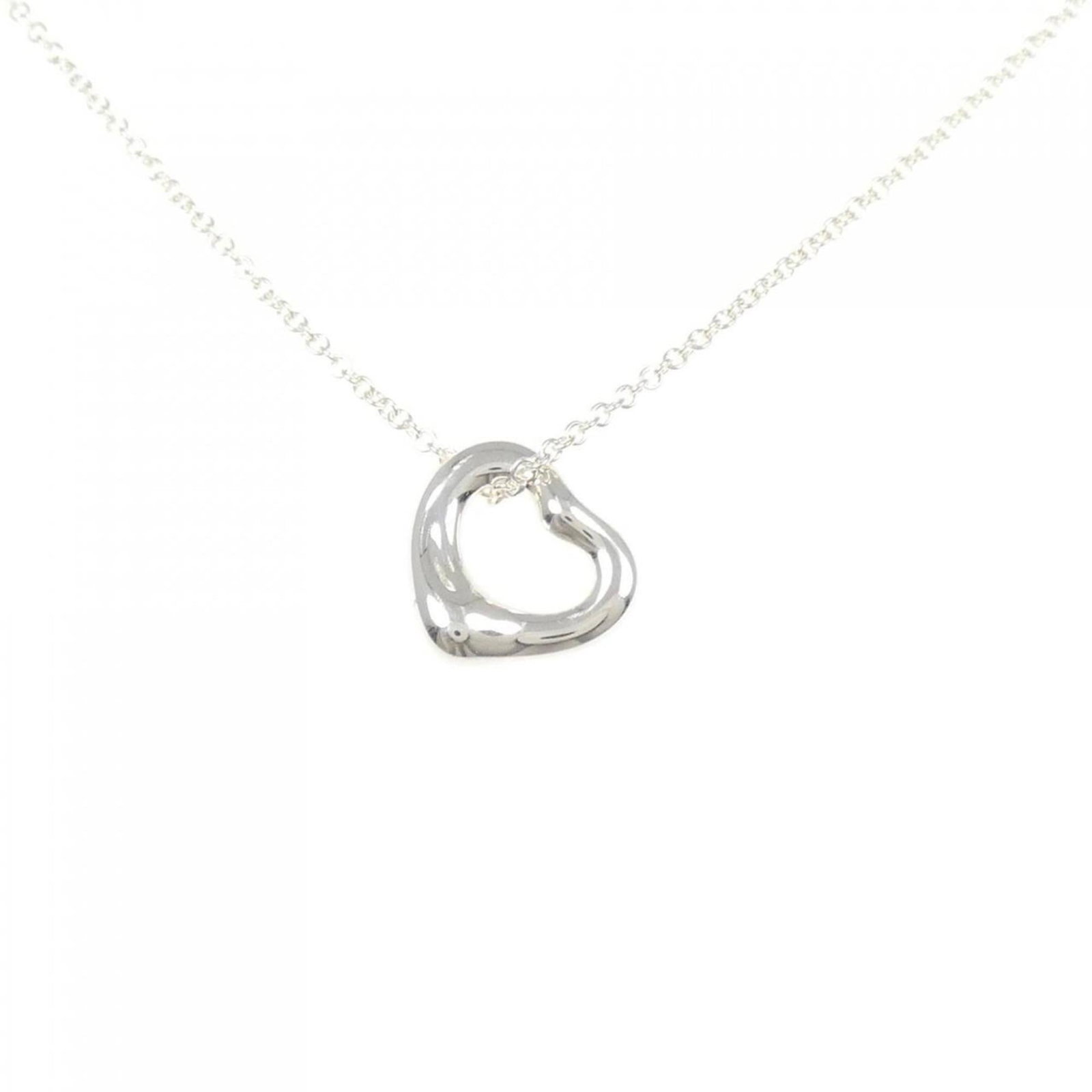 Tiffany Open Heart Necklace: Tiffany Open Heart Necklace The Tiffany Open Heart Necklace boasts an elegant design with a sterling silver pendant featuring intricate details. With its 41 cm adjustable neck circumference and