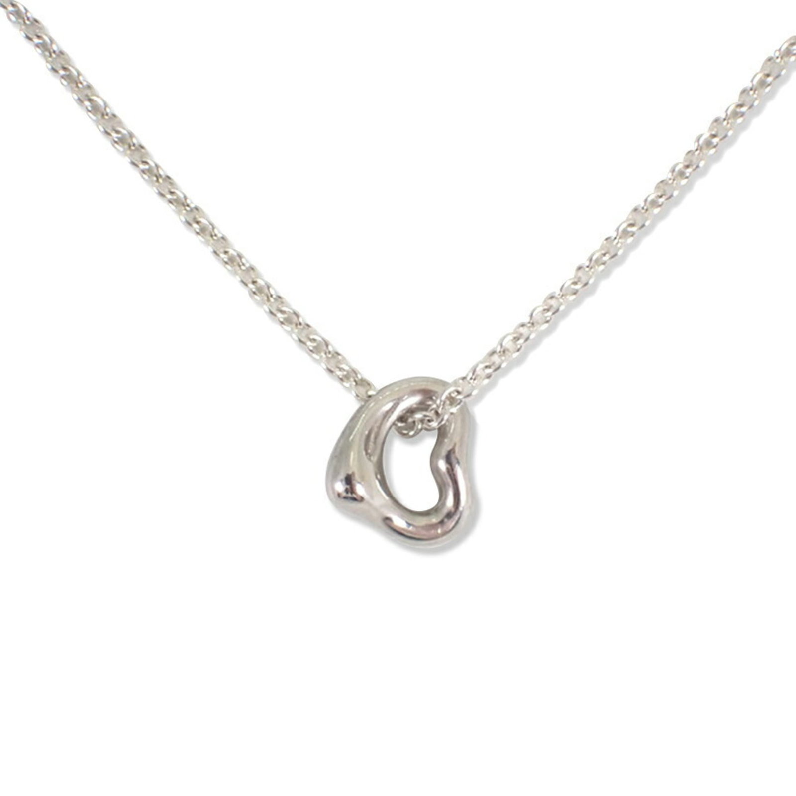 TIFFANY & Co. 925 Heart Pendant Necklace: TIFFANY & Co. 925 Heart Pendant Necklace Sterling silver pendant necklace with a heart design, measuring 6.7mm x 7mm and set on a 41.5 cm chain. The necklace features a subtle scratch and some minor