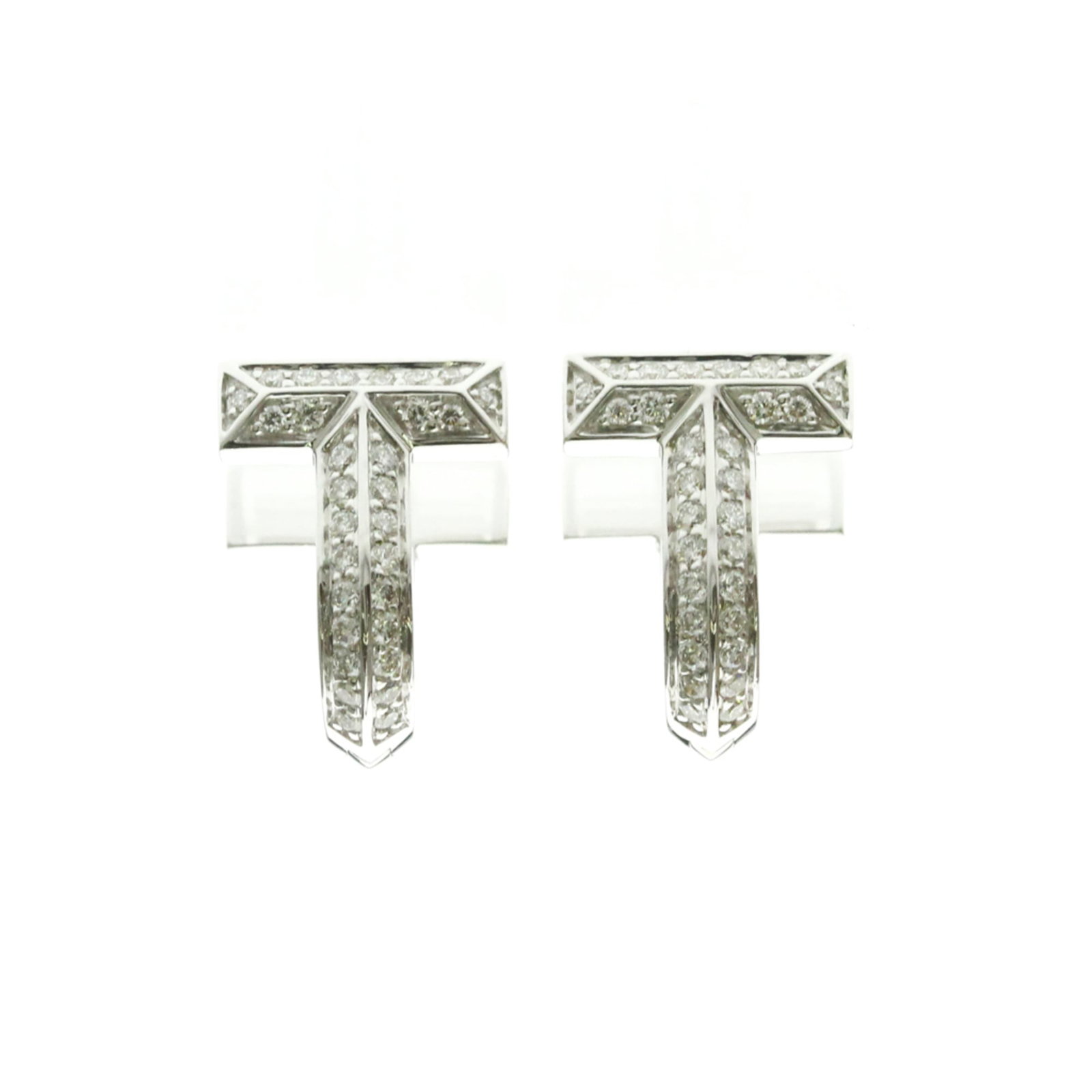 Tiffany Hoop Earrings White Gold (18K): Tiffany Hoop Earrings White Gold (18K) Tiffany's iconic hoop earrings shine in this stunning white gold (18K) design. Featuring a sleek silver diamond stone and a durable construction, these earrings