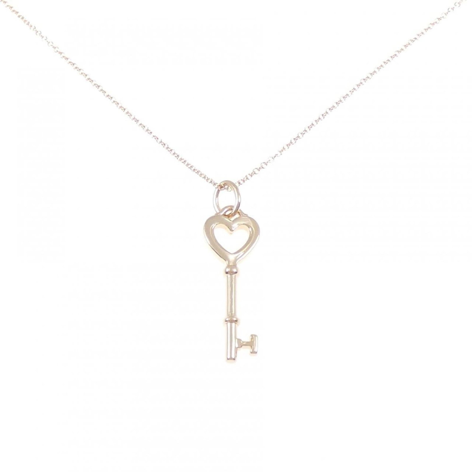 Tiffany Heart Key Mini Necklace: Tiffany Heart Key Mini Necklace Pink gold (18K) Tiffany Heart Key Mini Necklace in very good condition, featuring a small pendant with a 32.5mm x 9.5mm size and a subtle scratch or two from previous u