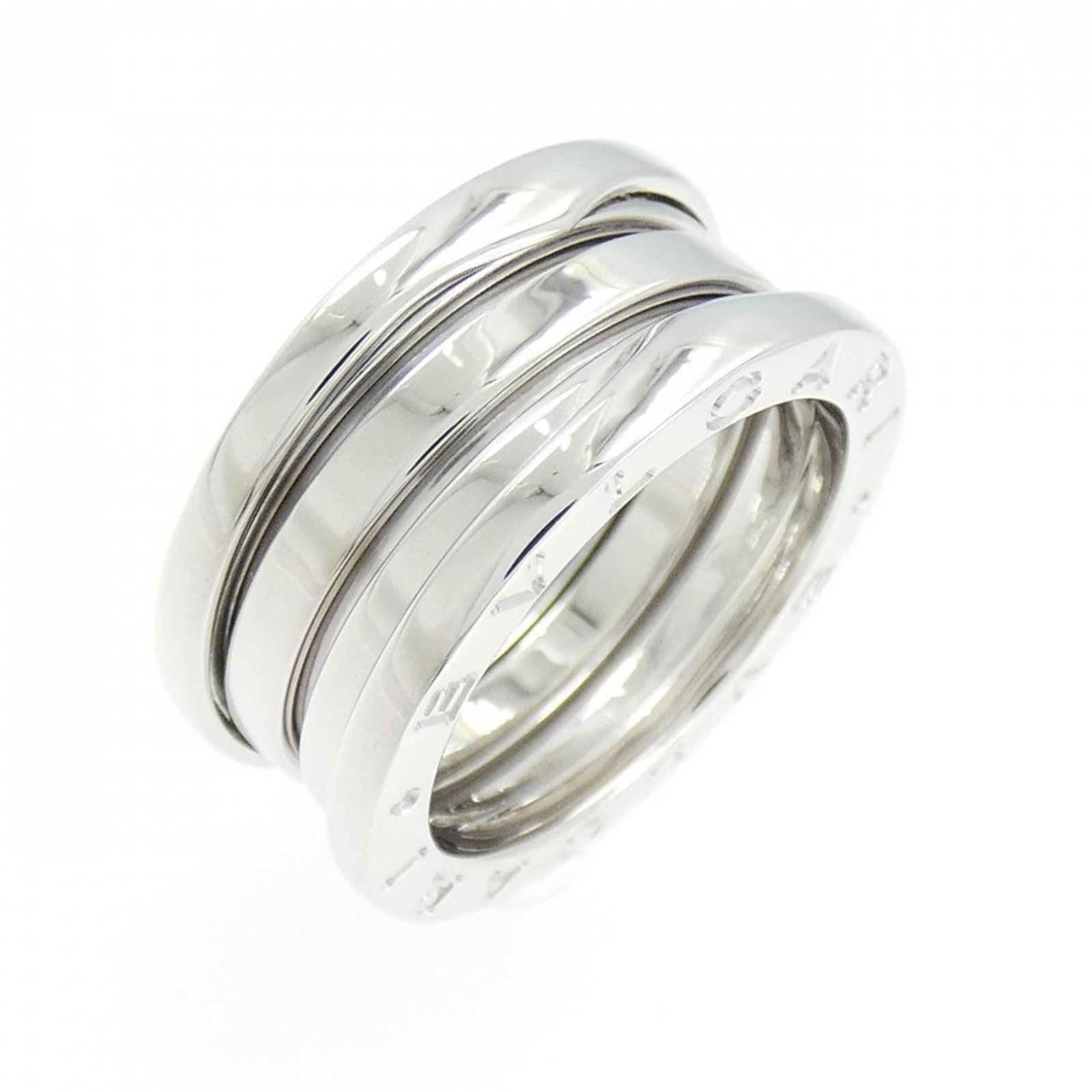 Bvlgari Band Ring White Gold (18K): Bvlgari Band Ring White Gold (18K) This Bvlgari Band Ring in white gold (18K) boasts a sleek design with a width of 9.1mm and an us size of 5. With its weight of 8.6g, this ring exudes a sense of luxu