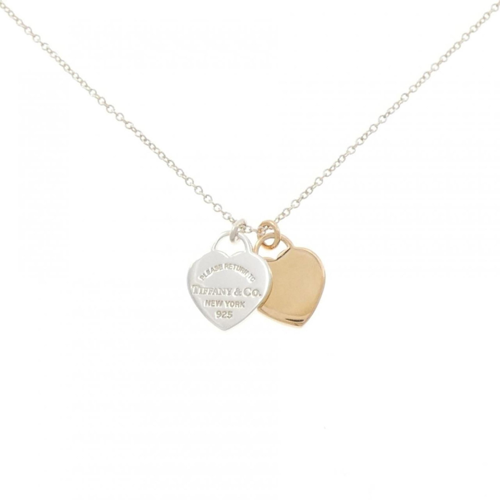 Tiffany & Co. Return to Double Heart Necklace: Tiffany & Co. Return to Double Heart Necklace Tiffany & Co.'s Return to Double Heart Necklace boasts a beautiful design with intricate details, featuring a striking double heart motif in pink gold (18