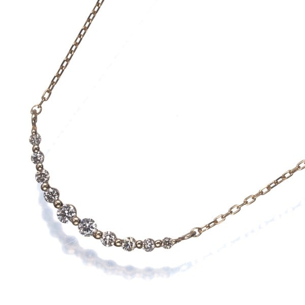 Diamond Lueur Necklace 416 Vendome Yellow Gold 10K: Diamond Lueur Necklace 416 Vendome Yellow Gold 10K Vendome's Lueur Necklace features a natural diamond pendant set in 10k yellow gold. The necklace showcases the beauty of the diamond against the
