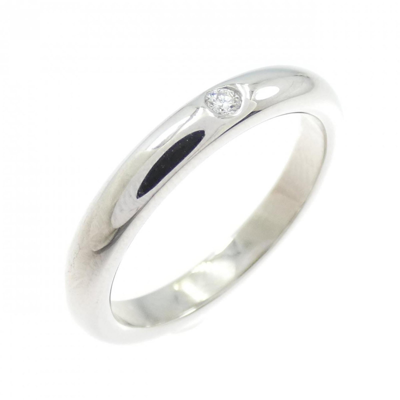 Tiffany Band Ring Platinum 950: Tiffany Band Ring Platinum 950 Platinum 950 Tiffany band ring with a diamond stone, available in US size 4. This used ring has some scratches and dirt, but remains in very good condition overall. A fe