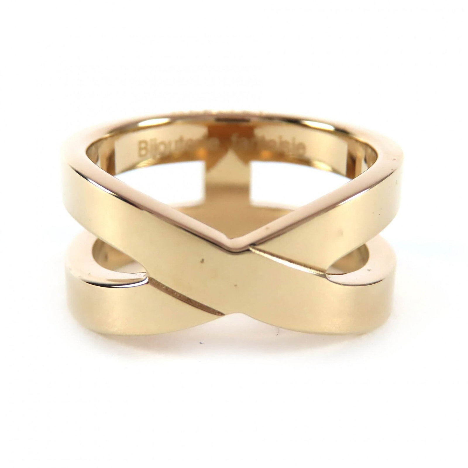 Hermes Band Ring: Hermes Band Ring 12mm gold band ring from Hermes in mint condition, bearing a signature. This like-new used item features the iconic brand's signature craftsmanship and attention to detail. A stylish 
