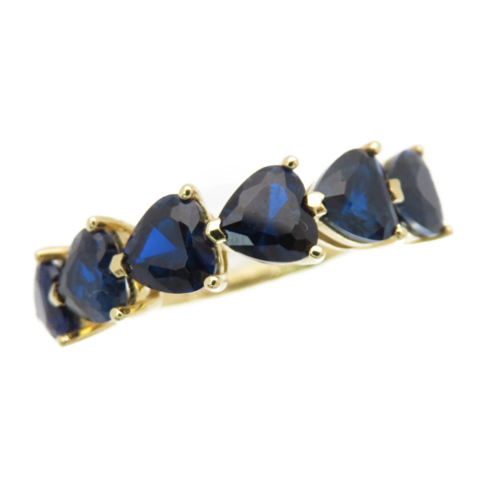 Tiffany Band Ring Yellow Gold (18K): Tiffany Band Ring Yellow Gold (18K) Yellow gold Tiffany band ring with blue sapphire stone, crafted in 18K purity. This pre-owned piece features subtle signs of use and minor damage, still in