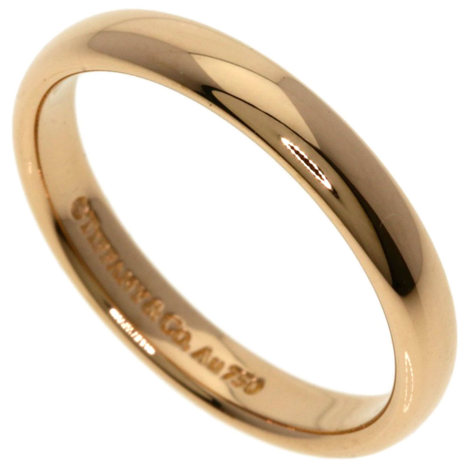Tiffany Band Ring Pink Gold (18K): Tiffany Band Ring Pink Gold (18K) Tiffany's iconic pink gold band ring boasts a slim profile and elegant design. Made from high-quality 18K pink gold, this used ring features a few subtle signs of