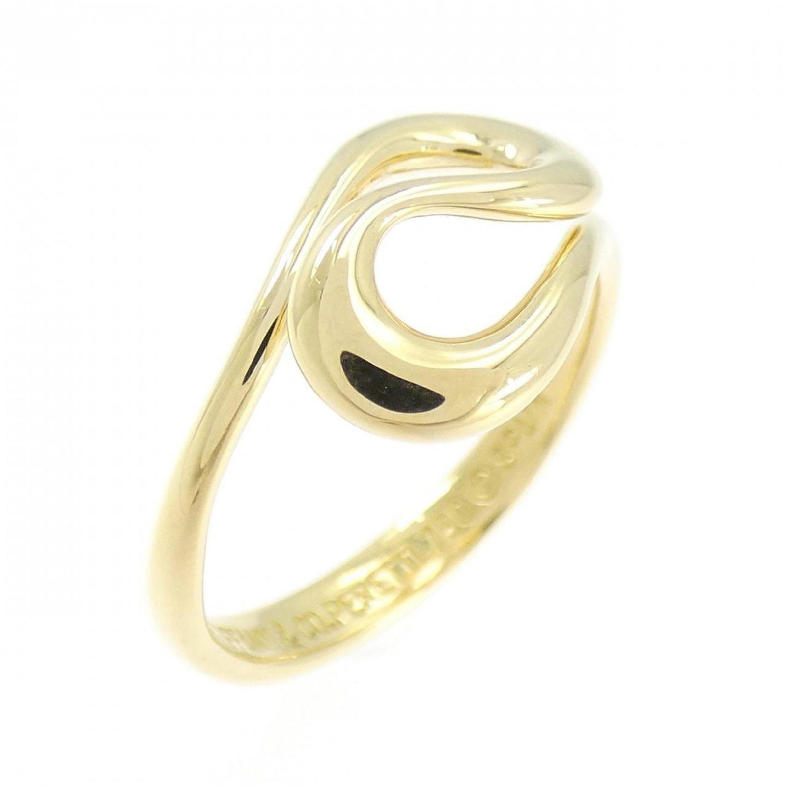 Tiffany Band Ring Yellow Gold (18K): Tiffany Band Ring Yellow Gold (18K) Tiffany's iconic yellow gold band ring boasts a sleek design and premium 18K material. With its classic style and subtle scratches from past wear, this used ring