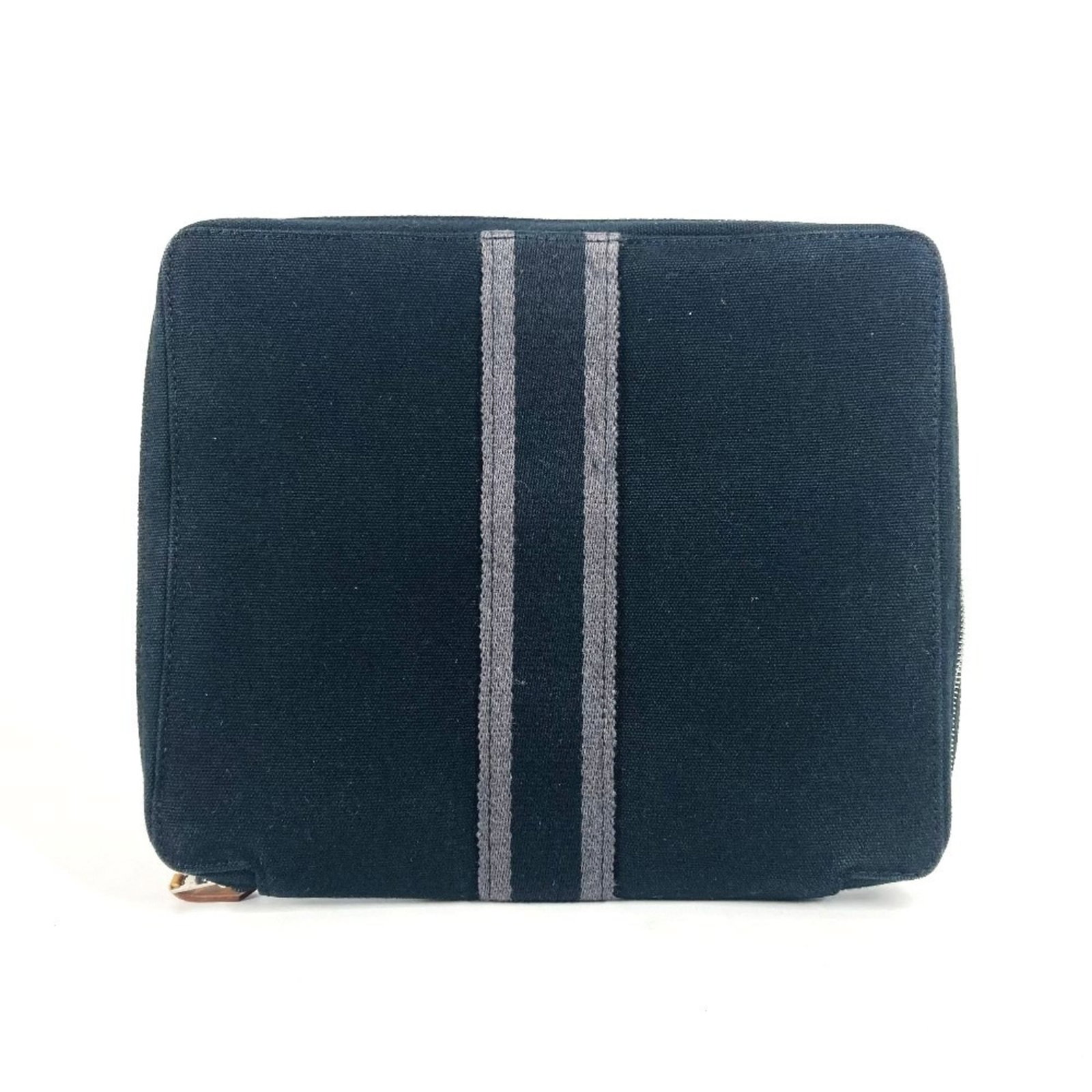 Hermes Jewelry Case Cotton: Hermes Jewelry Case Cotton This black cotton jewelry case has a size of 18.5cm x 2cm and shows traces of usage with minor scratches and dirt. Despite its worn condition, the case remains in good overa