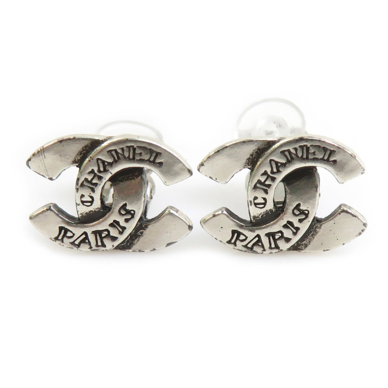 Chanel Clip Earrings Metal: Chanel Clip Earrings Metal Chanel's iconic clip earrings are a timeless accessory for women. Made from metal and available in silver, these earring clips feature a classic design that adds a touch of