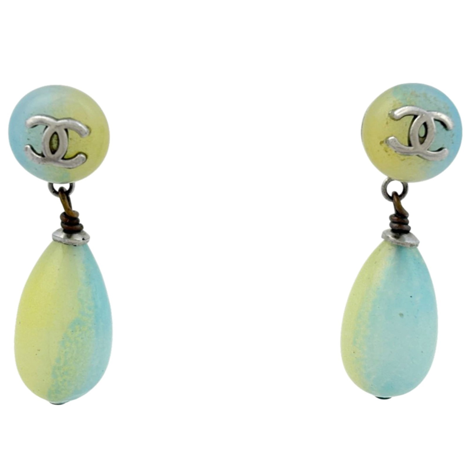 Chanel Drop Earrings Plastic: Chanel Drop Earrings Plastic Chanel's iconic drop earrings are available in this silver-plated plastic version. Featuring a bold blue and yellow color combination, these earrings showcase the classic