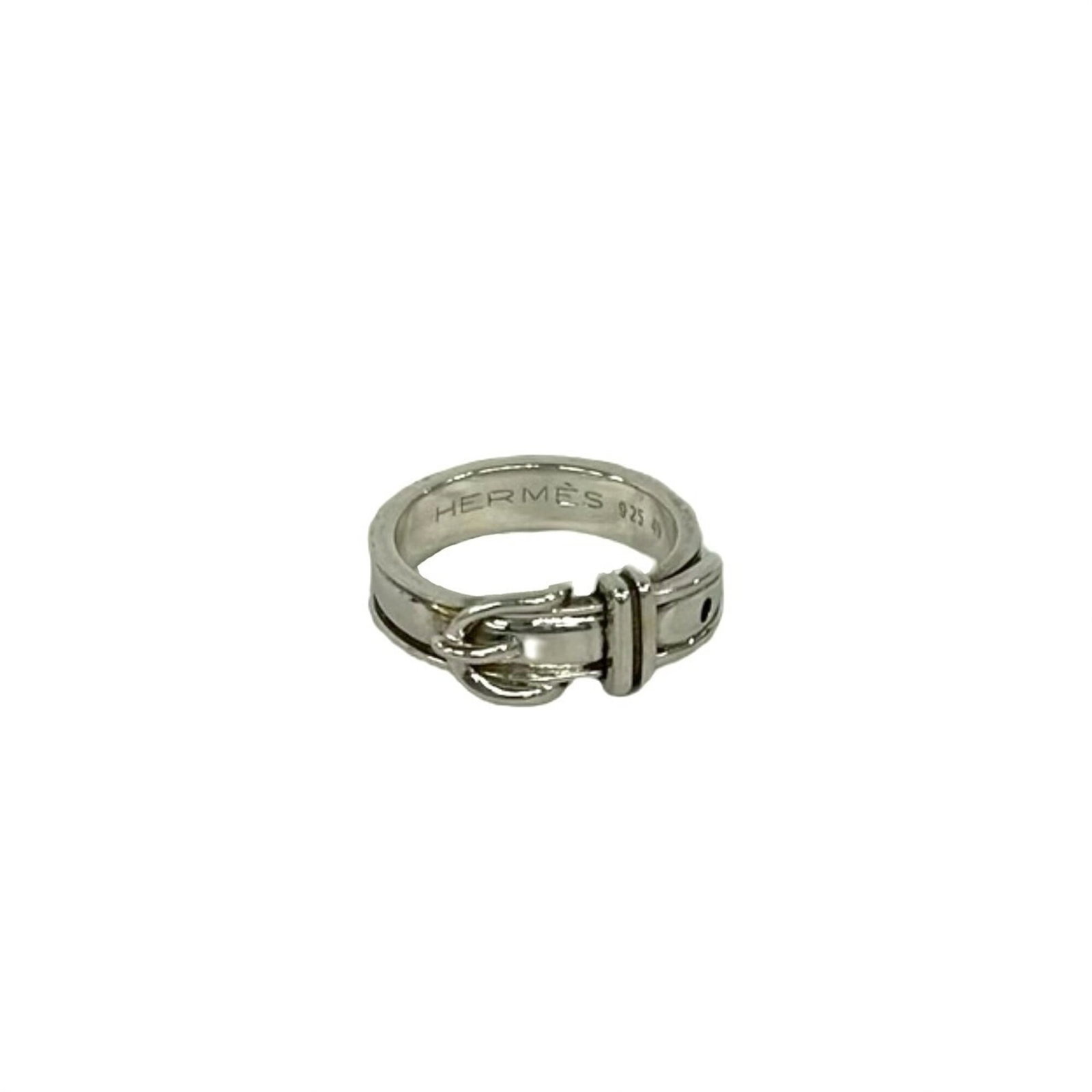 Hermes Band Ring Silver 925: Hermes Band Ring Silver 925 Silver 925 band ring from Hermes features a sleek design with subtle craftsmanship. The piece has been used and shows signs of wear, including scratches and minor dirt accu